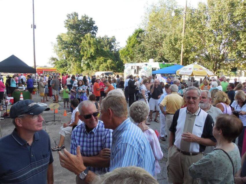 Crowd standing among tents outside Union Station Depot