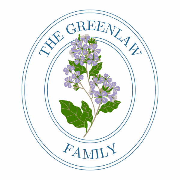Tiny purple flowers with words The Greenlaw Family